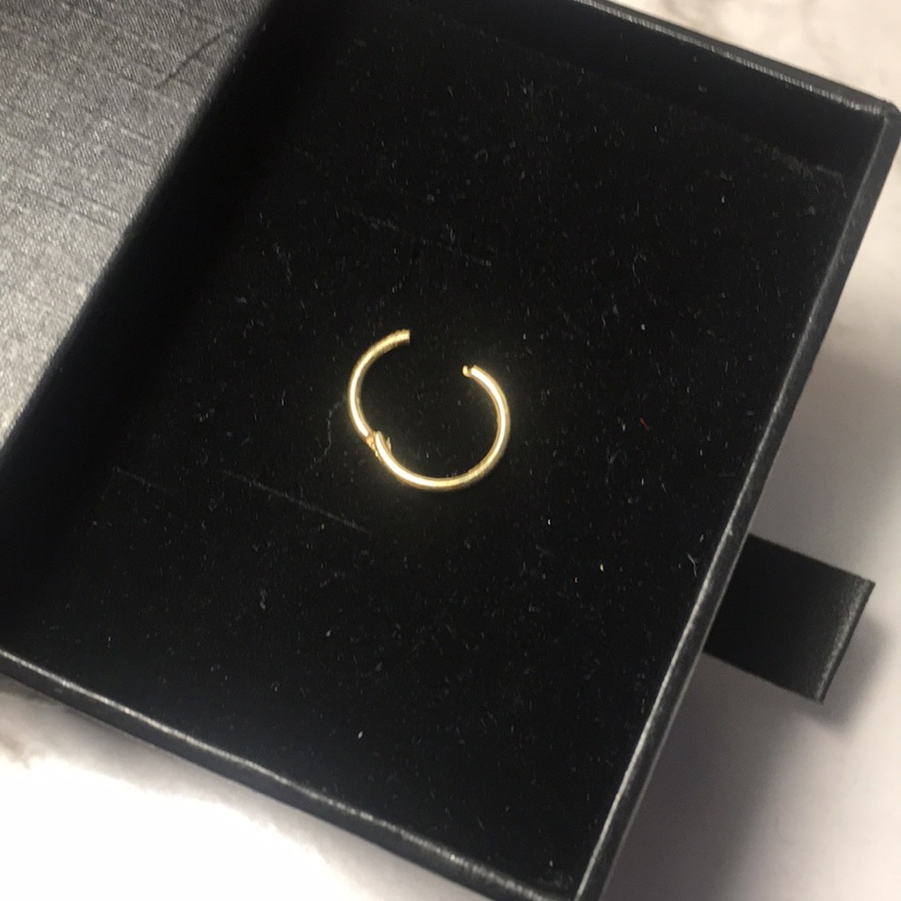 Maria Tash gold hoop earring